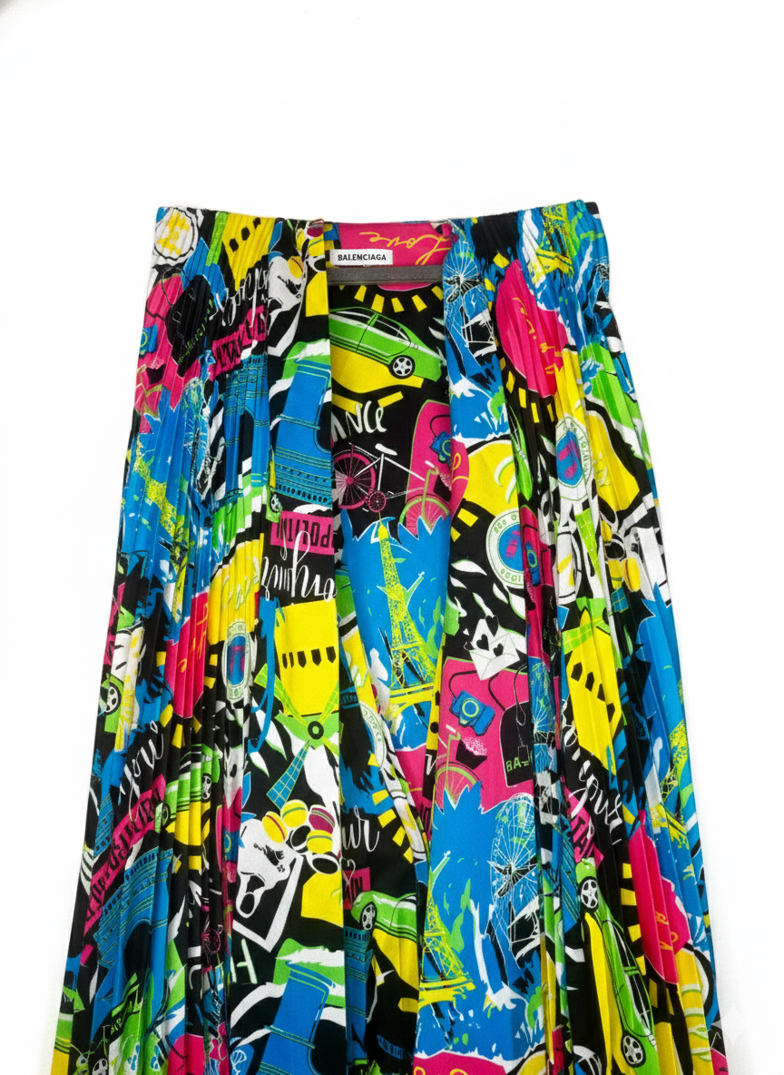 Pre-loved Balenciaga multicolour dress draped styling shot showing fluid cape silhouette.