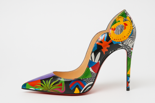 Side view of brand new Christian Louboutin Hot Chick 100 pumps in multicolour graffiti print.
