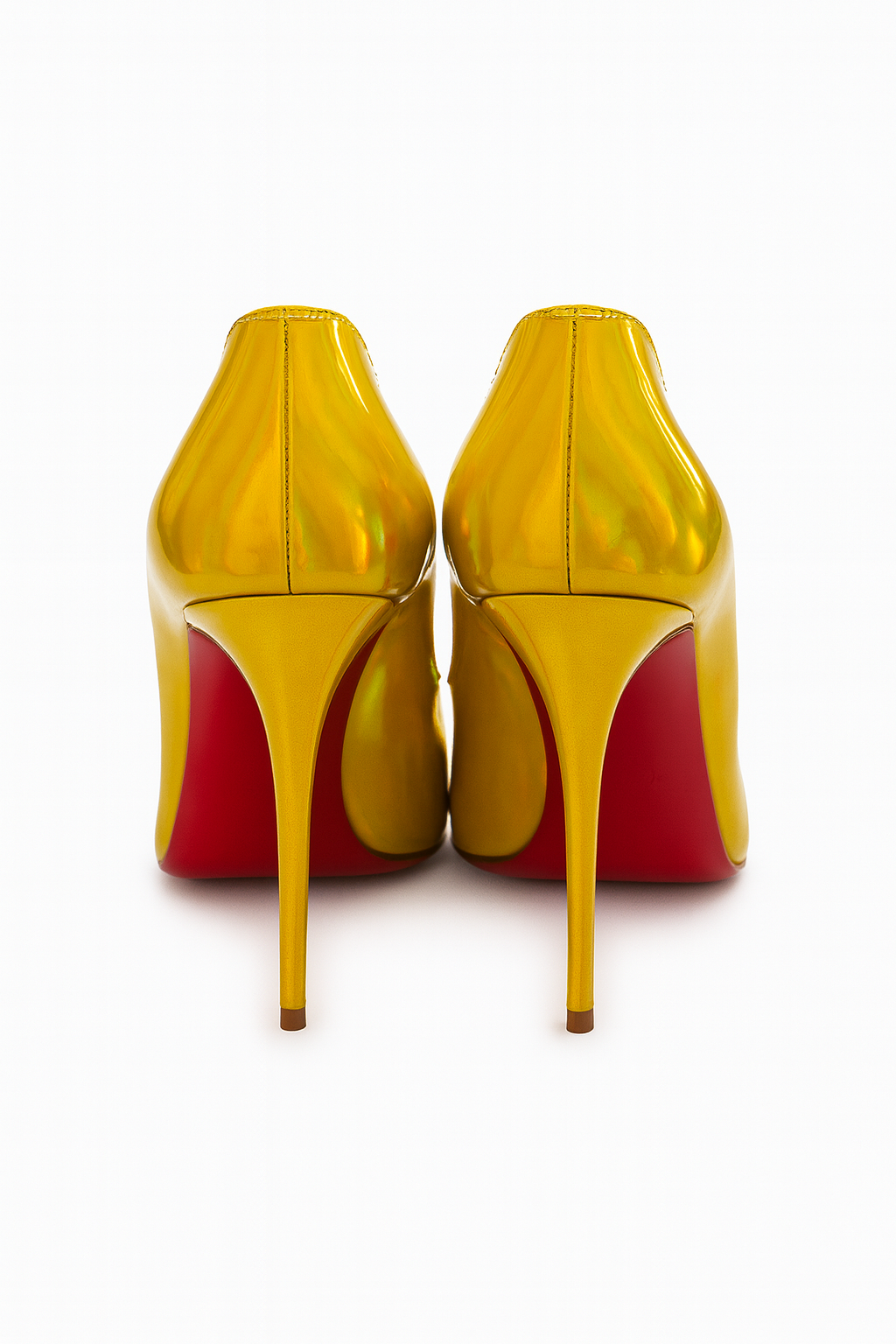 Back view of Christian Louboutin Hot Chick 100 stiletto heels showing sculpted heel shape.