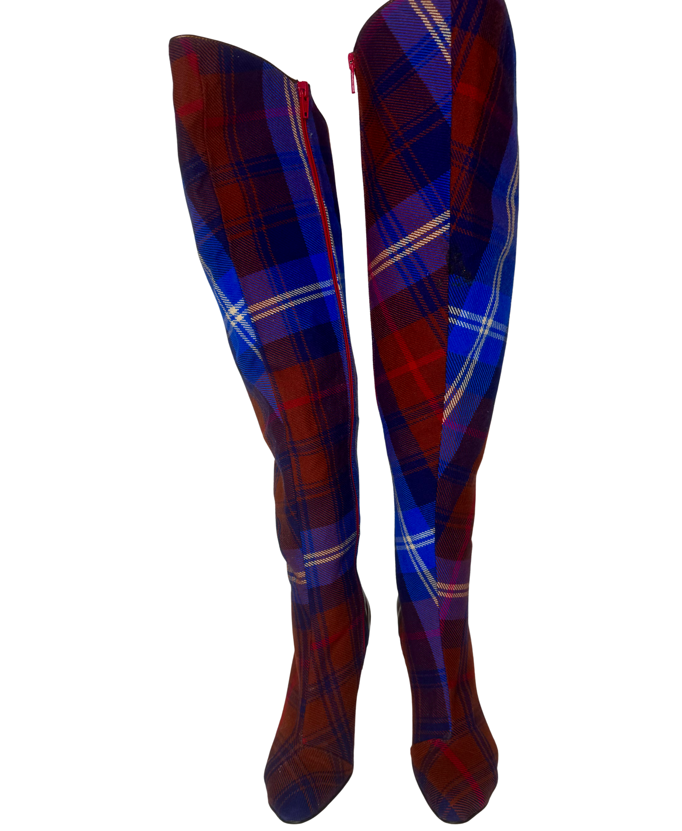 Front view of Vivienne Westwood special edition over-the-knee boots in multicolour tartan fabric with pointed toe and high stiletto heel.