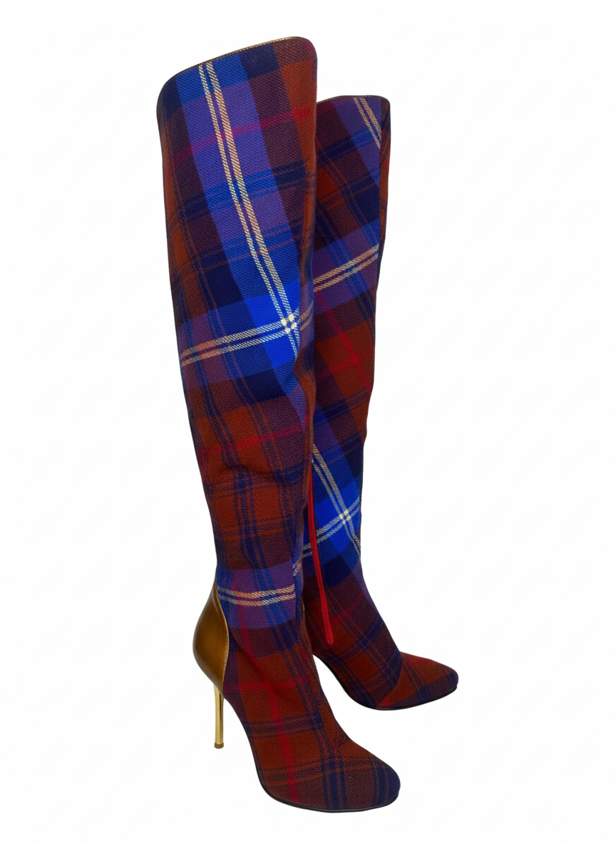Side view of Vivienne Westwood special edition tartan boots highlighting the fitted over-the-knee silhouette and sculpted heel profile.