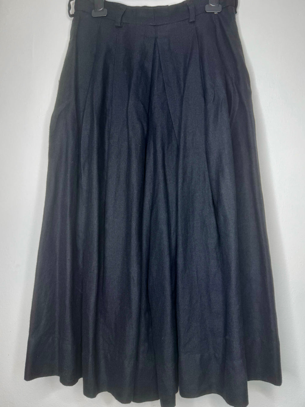 Back view of vintage Vivienne Westwood black culotte skirt showing clean lines and fluid drape.