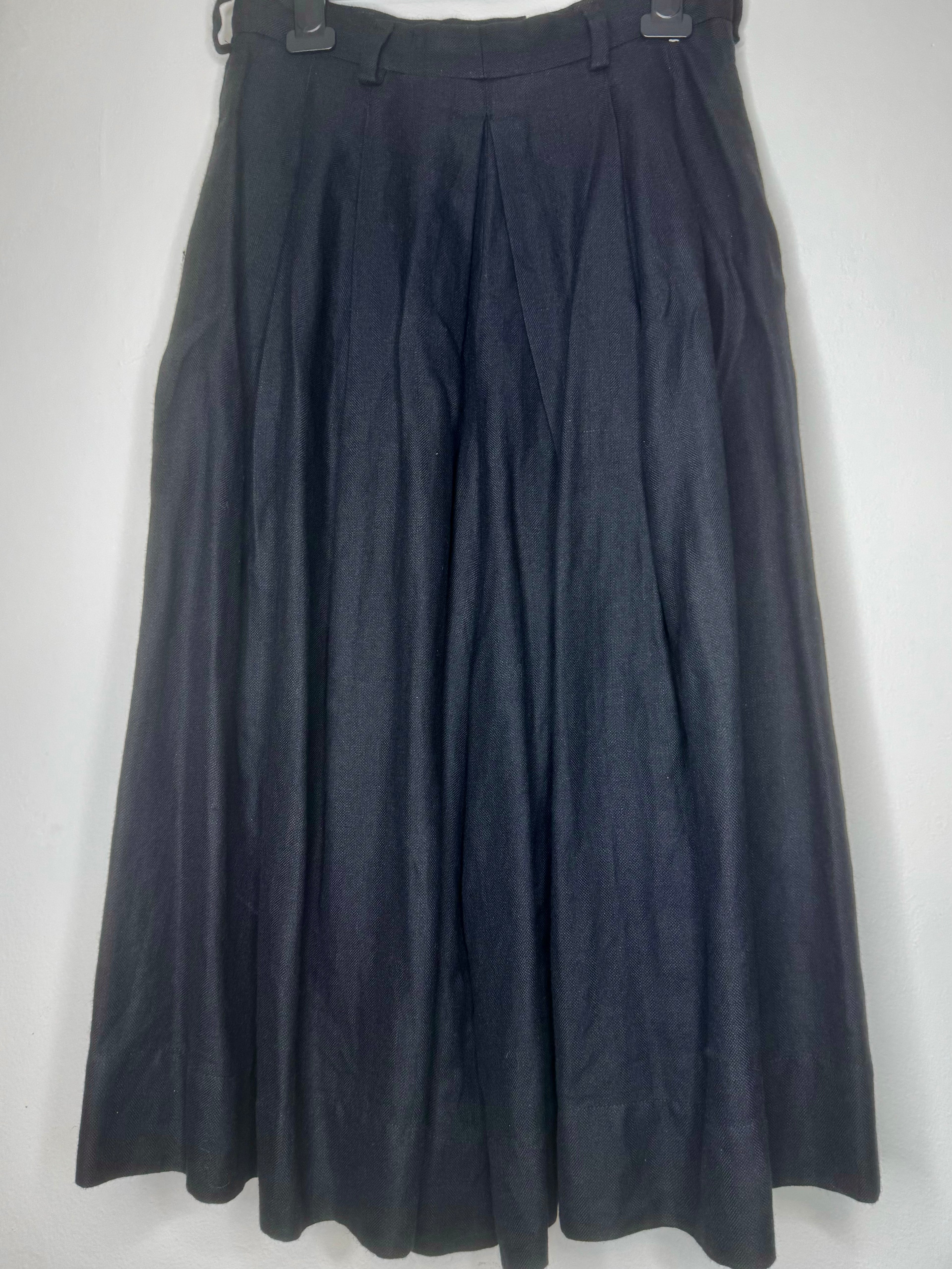 Back view of vintage Vivienne Westwood black culotte skirt showing clean lines and fluid drape.